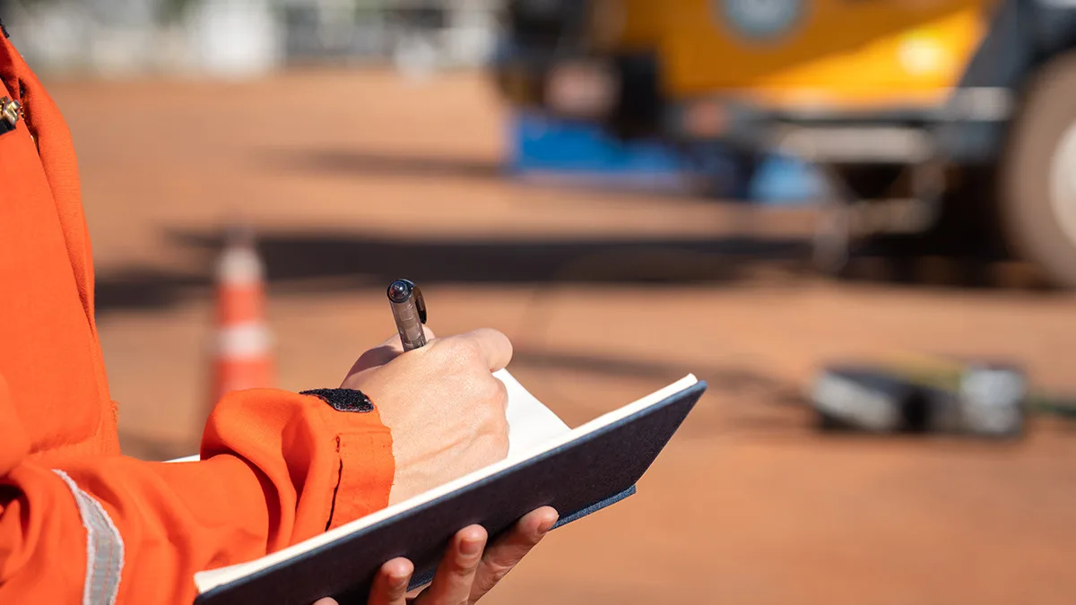 worker performing a road check